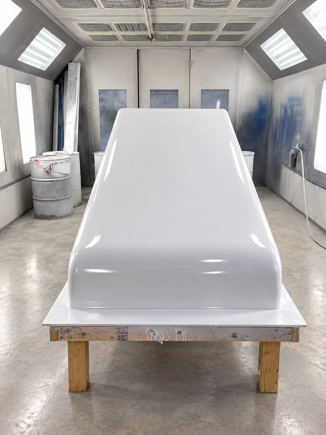 A freshly coated fiberglass shell drying in the WRT spray booth